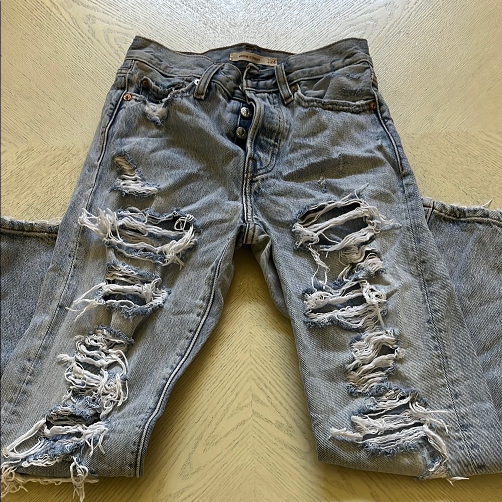 Levi's Distressed Light Blue Relaxed Jeans